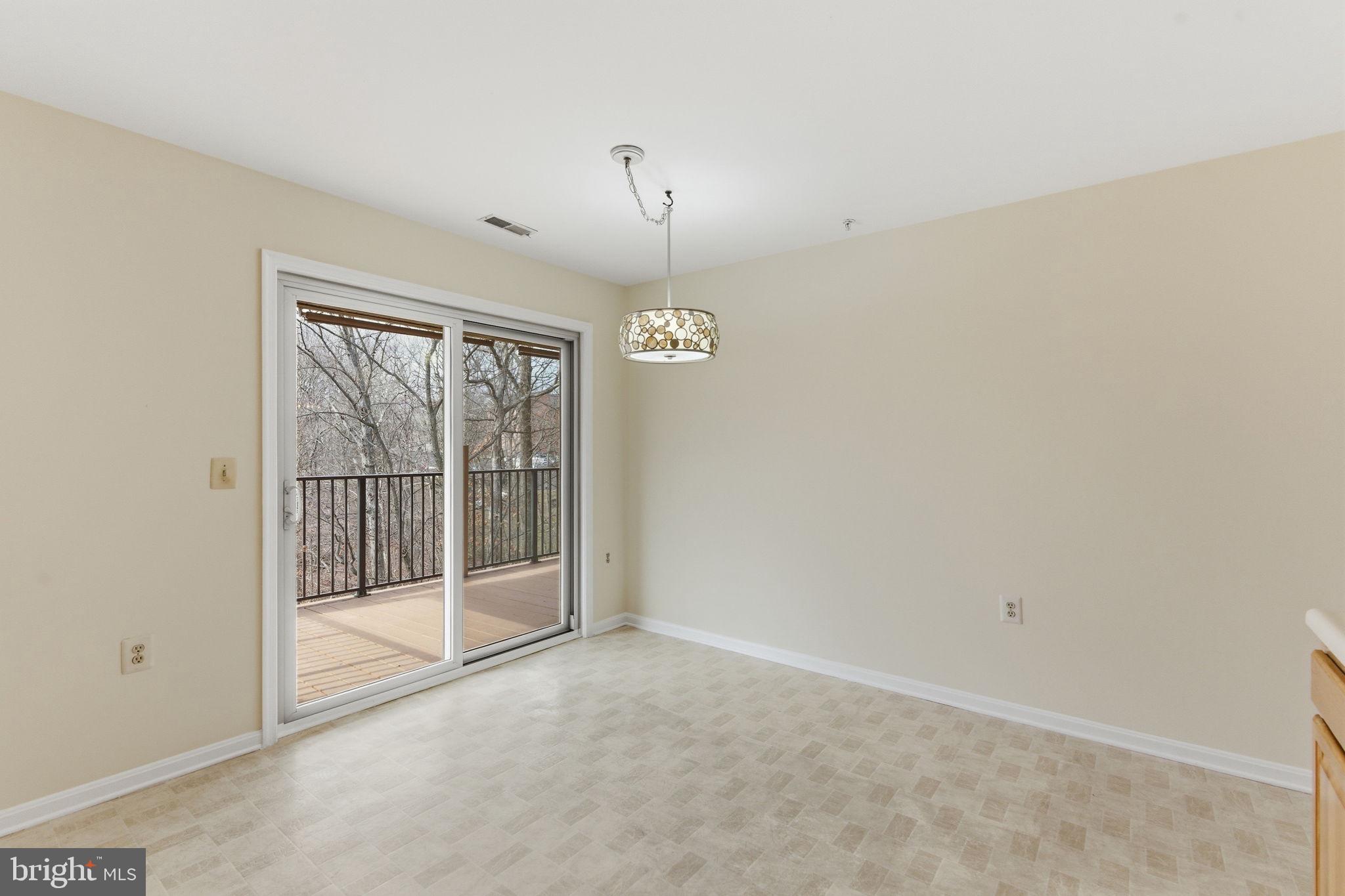 3901 Darleigh Road, Unit 3G Baltimore, MD 21236 - Photo 14 of 41 a view of an empty room with a window