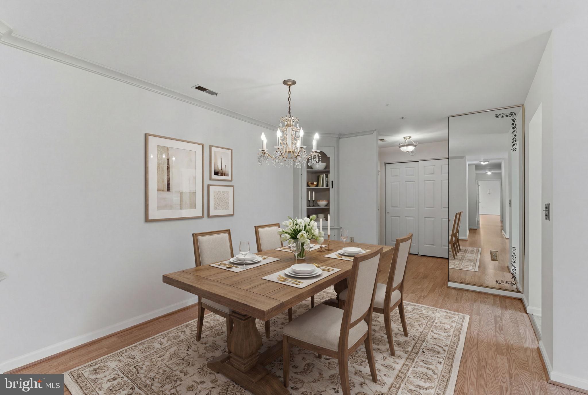 3901 Darleigh Road, Unit 3G Baltimore, MD 21236 - Photo 20 of 41 a view of a dining room with furniture and wooden floor
