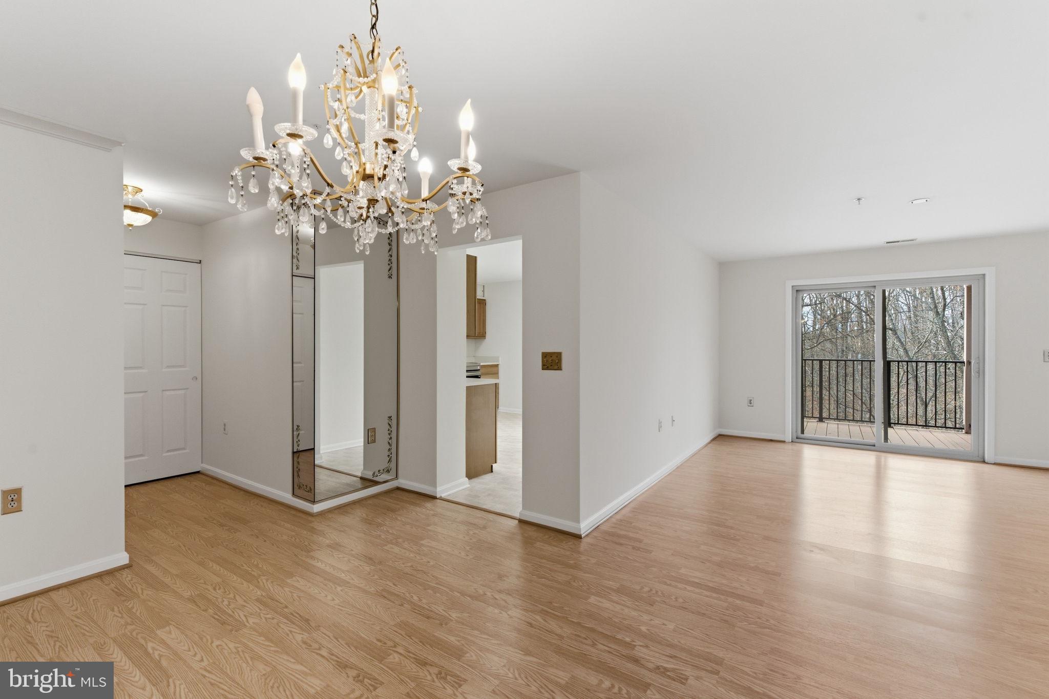3901 Darleigh Road, Unit 3G Baltimore, MD 21236 - Photo 41 of 41 wooden floor in an empty room with a window