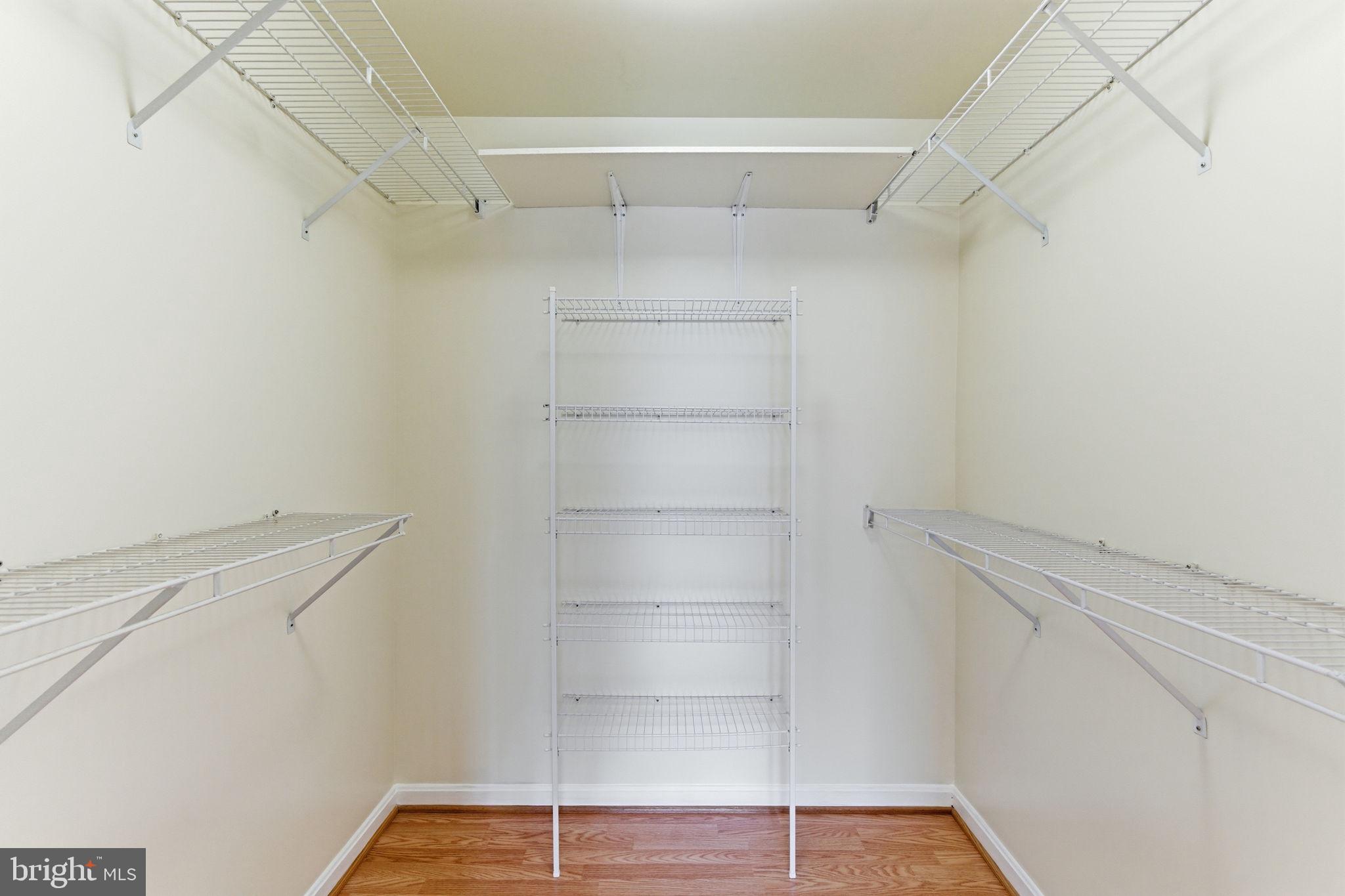 3901 Darleigh Road, Unit 3G Baltimore, MD 21236 - Photo 29 of 41 a view of walk in closet with empty racks