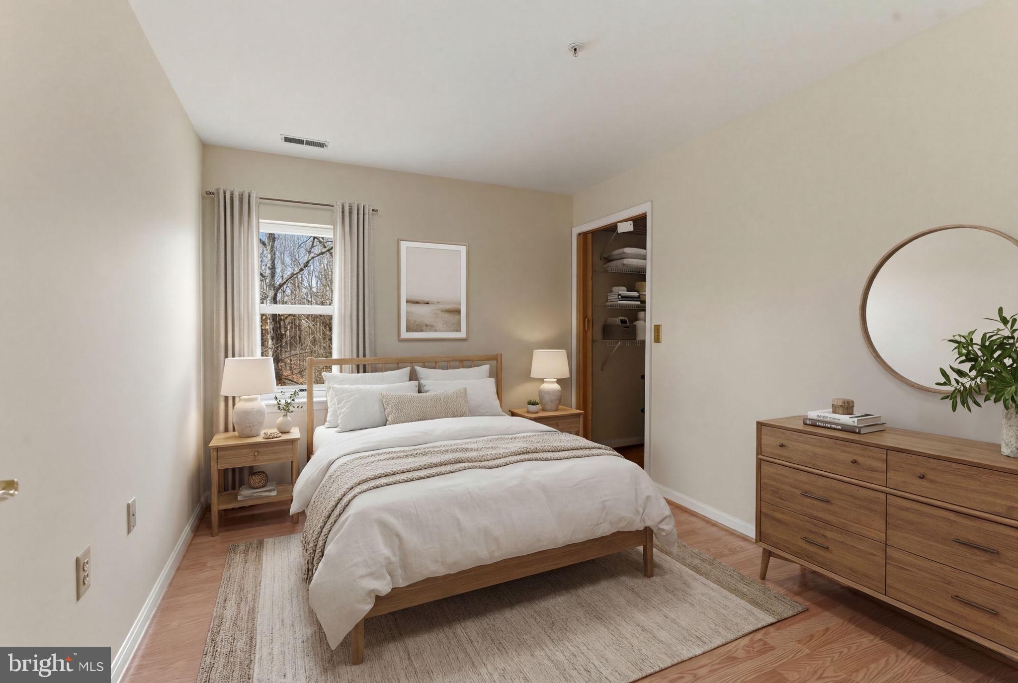 3901 Darleigh Road, Unit 3G Baltimore, MD 21236 - Photo 33 of 41 a bedroom with a bed and a dresser