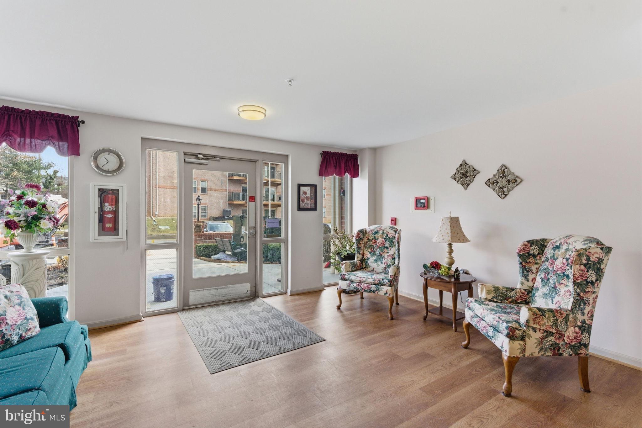 3901 Darleigh Road, Unit 3G Baltimore, MD 21236 - Photo 4 of 41 a living room with furniture and wooden floor