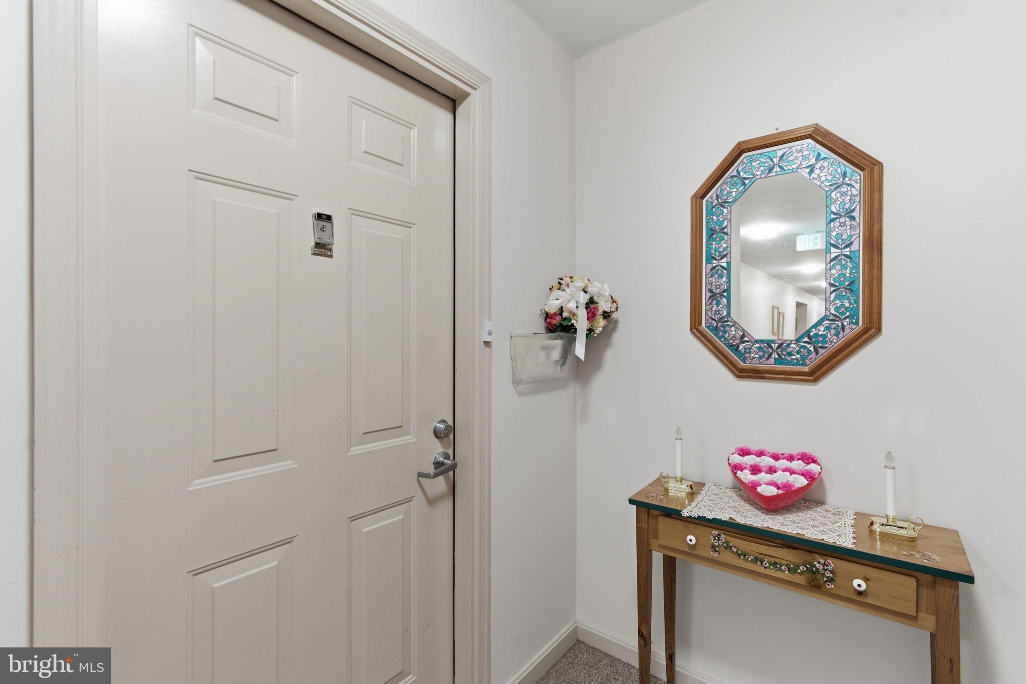 3901 Darleigh Road, Unit 3G Baltimore, MD 21236 - Photo 8 of 41 a view of a hallway with workspace