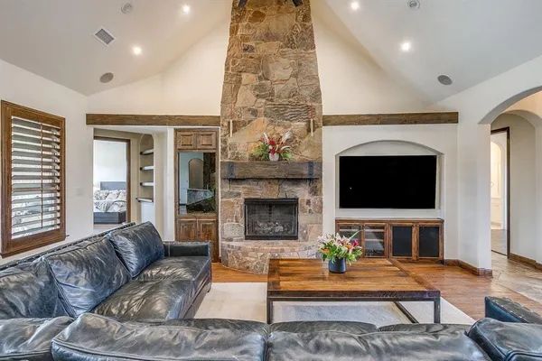 a view of a living room with furniture