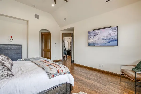 a spacious bathroom with a double vanity sink a mirror and a bathtub