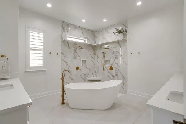 a bed room with furniture and a flat screen tv