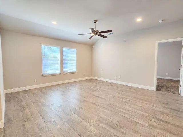 a bathroom with double sink and a mirror