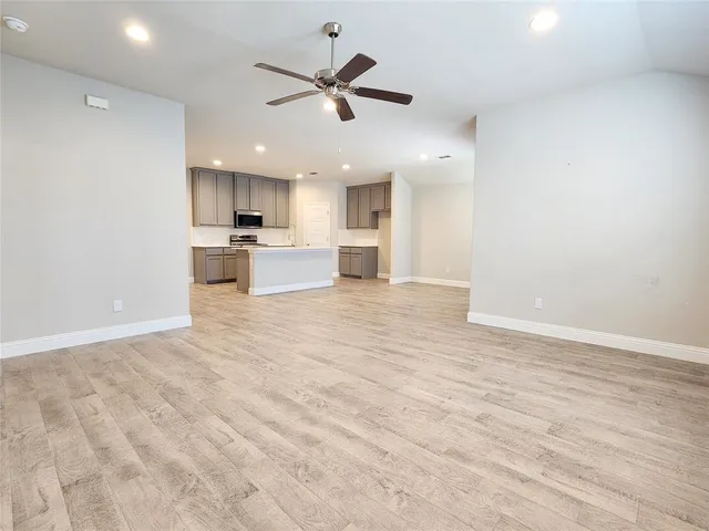 a bathroom with a sink vanity and a mirror