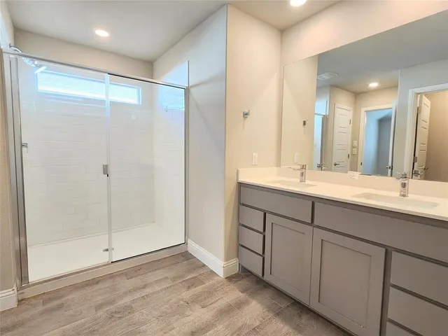 a view of an empty room and closet area