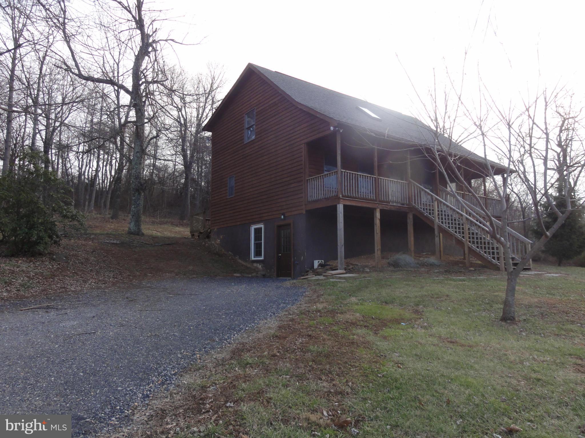 4437 Remount Road Front Royal, VA 22630 - Photo 2 of 22 a view of a house with a yard