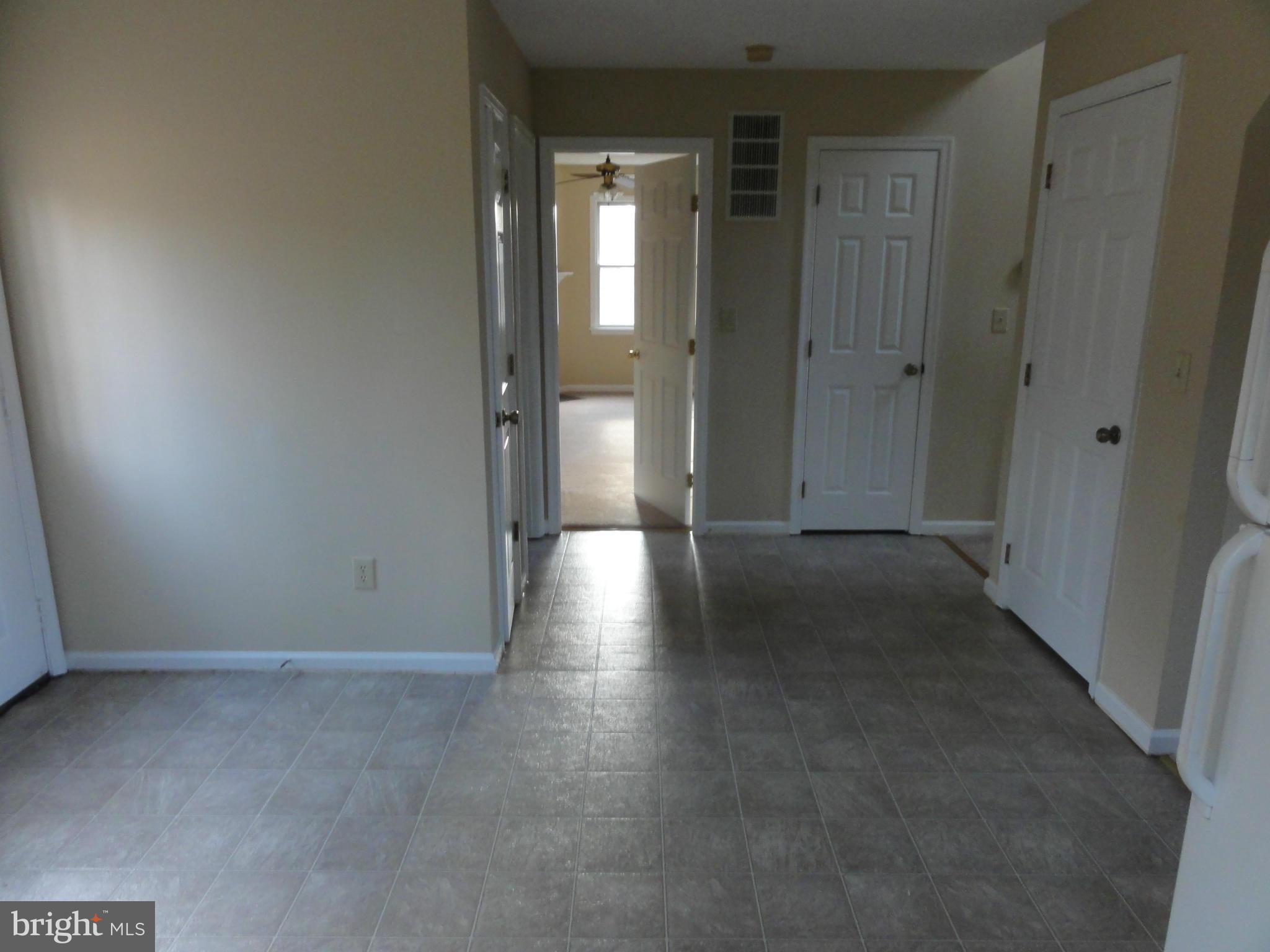 4437 Remount Road Front Royal, VA 22630 - Photo 12 of 22 a view of a hallway with wooden floor
