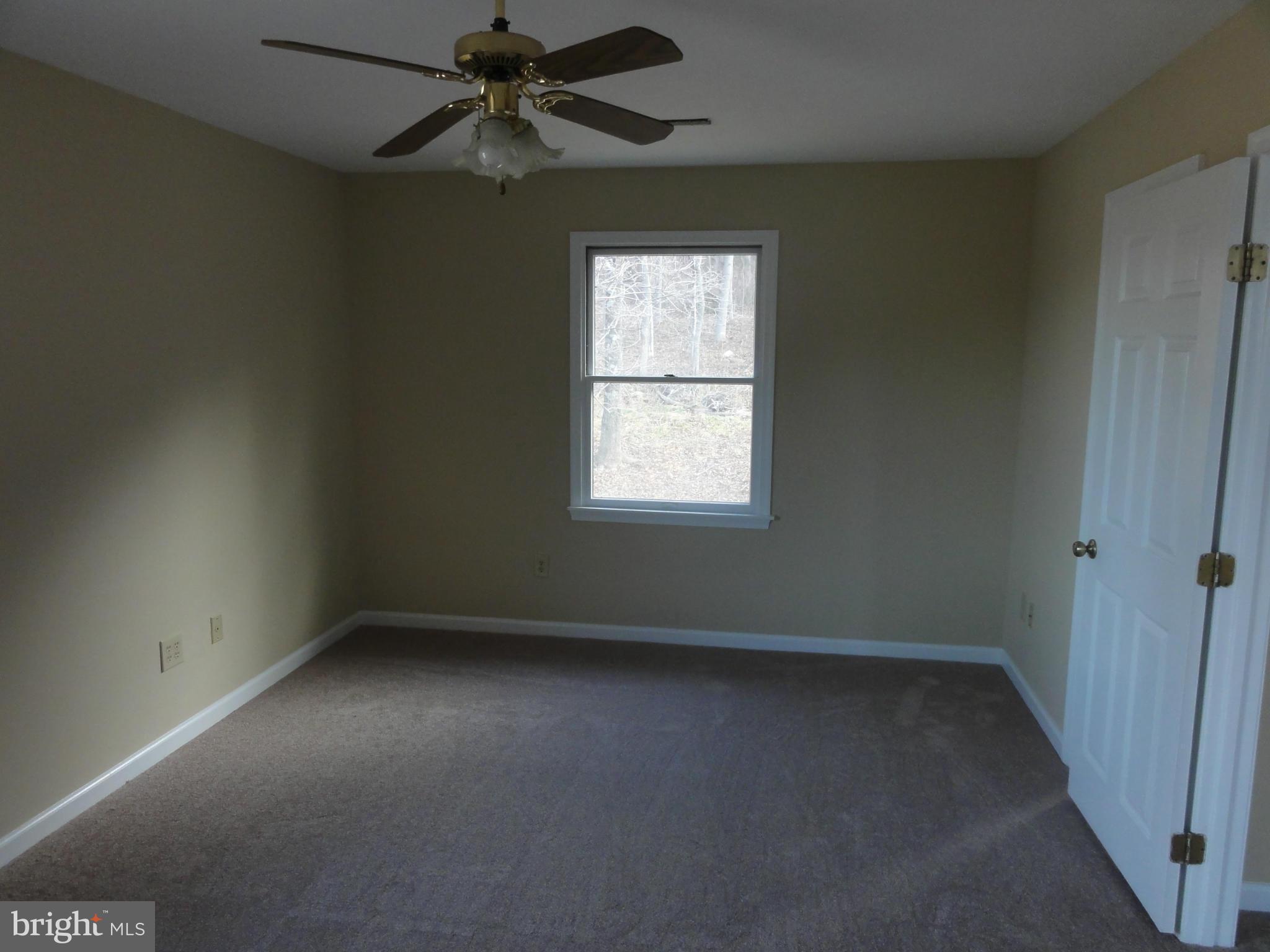 4437 Remount Road Front Royal, VA 22630 - Photo 15 of 22 an empty room with a window