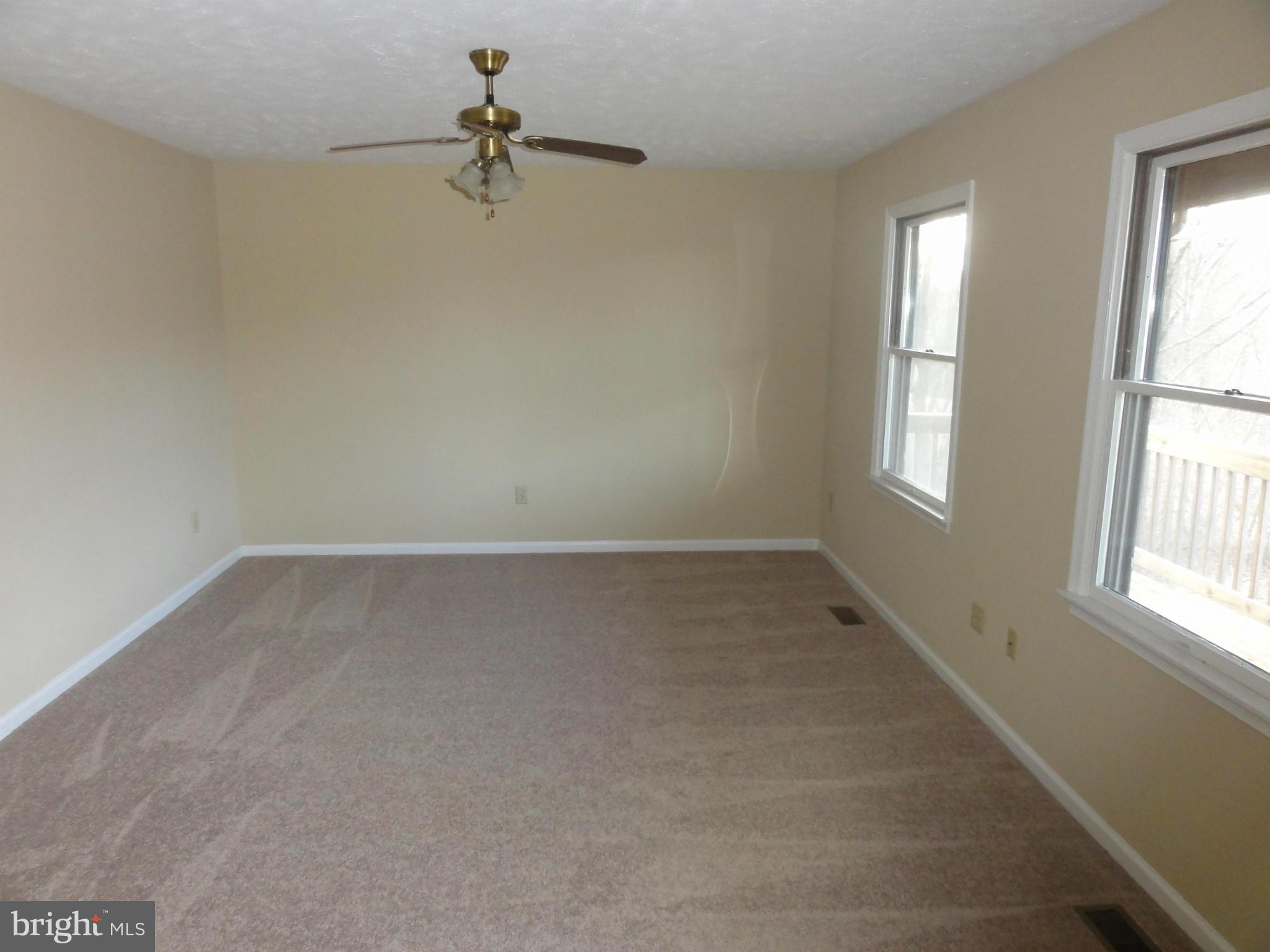 4437 Remount Road Front Royal, VA 22630 - Photo 4 of 22 wooden floor in an empty room with a window