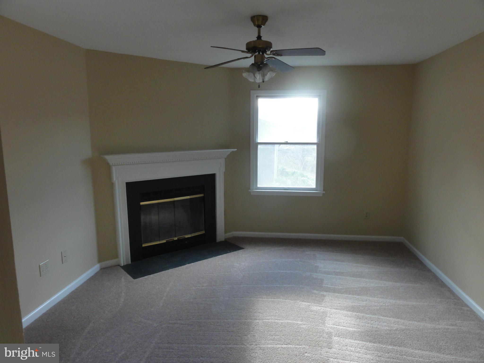4437 Remount Road Front Royal, VA 22630 - Photo 7 of 22 a view of empty room with a fireplace