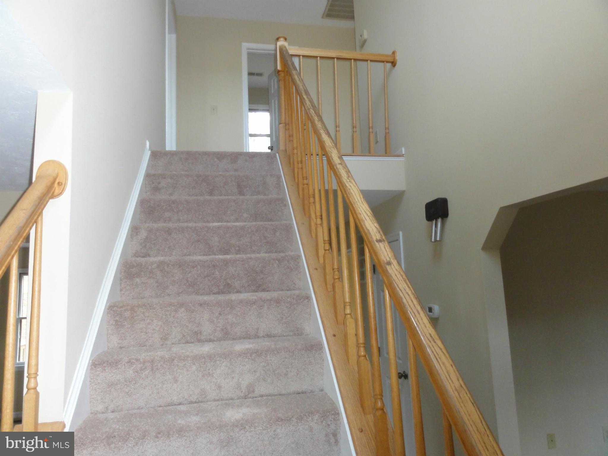 4437 Remount Road Front Royal, VA 22630 - Photo 8 of 22 a view of staircase with railing and white walls