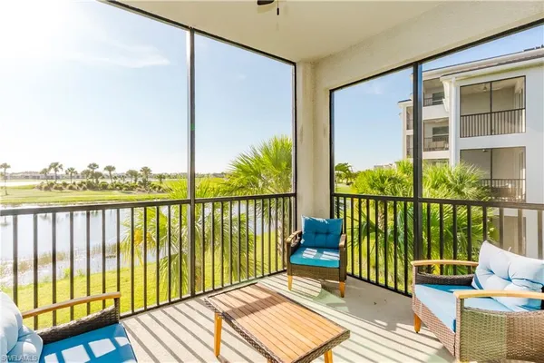 a view of balcony with furniture