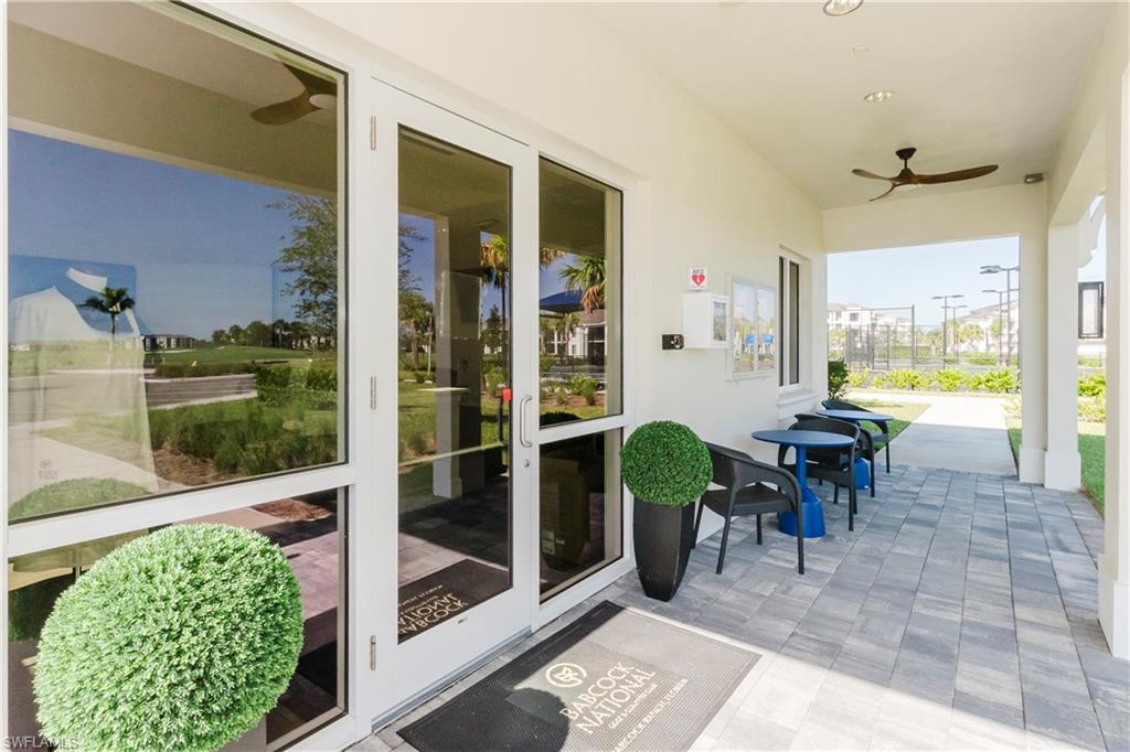 43993 Boardwalk Loop, Unit 1928 Babcock Ranch, FL 33982 - Photo 31 of 50 a view of two chairs in the balcony