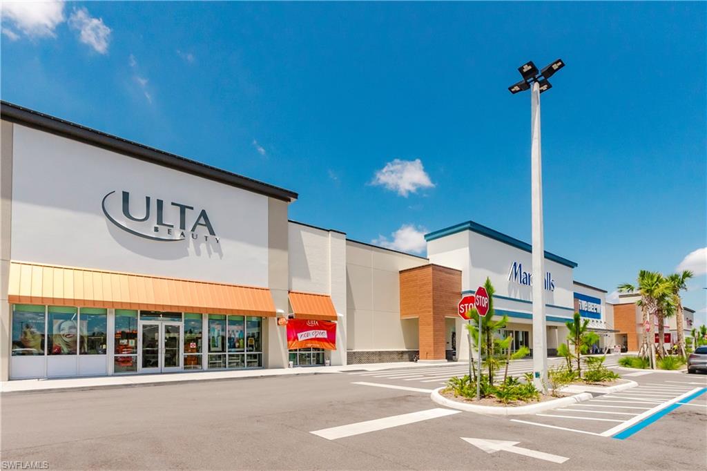 43993 Boardwalk Loop, Unit 1928 Babcock Ranch, FL 33982 - Photo 45 of 50 a view of a building with traffic signal lights