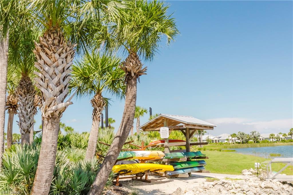 43993 Boardwalk Loop, Unit 1928 Babcock Ranch, FL 33982 - Photo 47 of 50 a view of a swimming pool and outdoor space