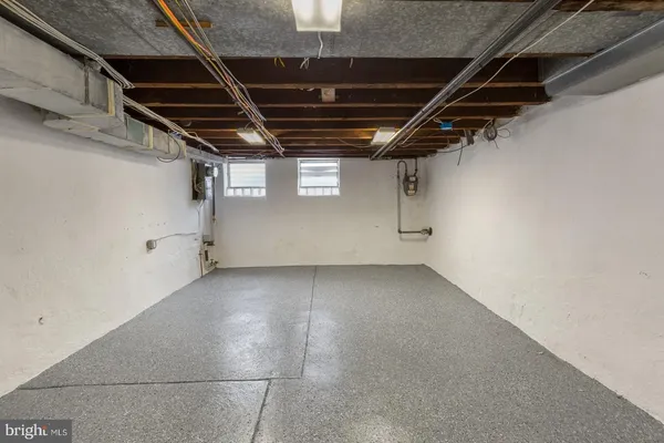 a view of a room with wooden walls