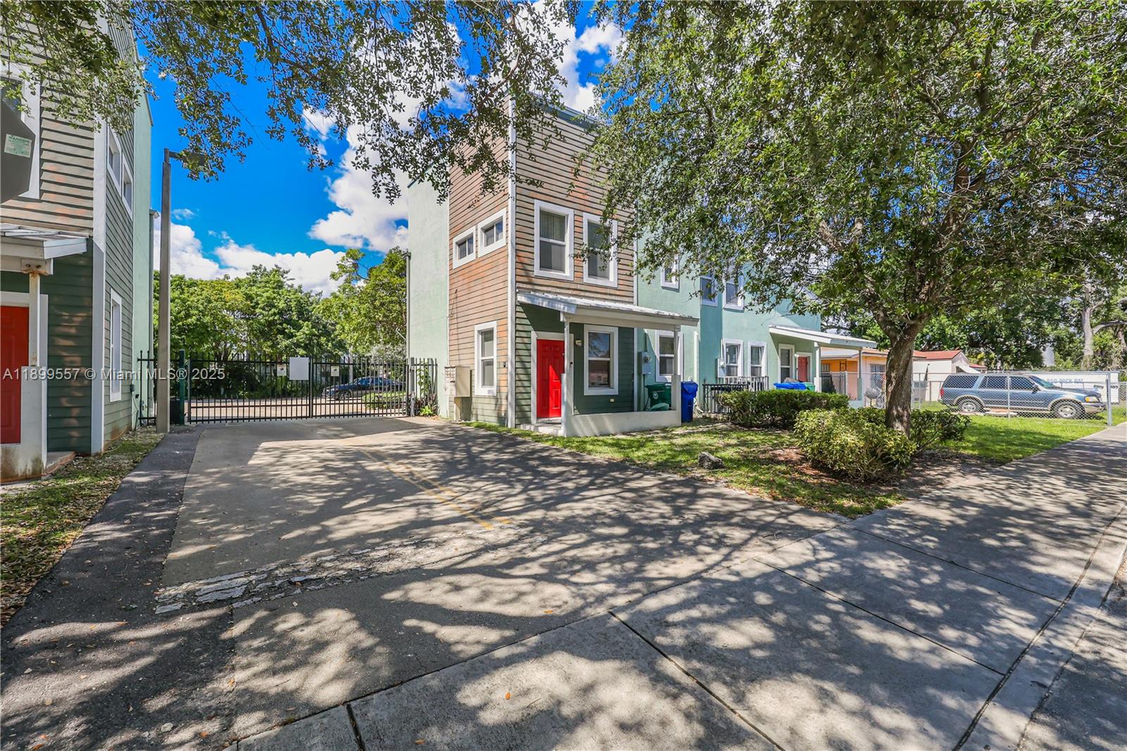 6960 Northwest 4th Avenue, Unit 3 Miami, FL 33150 - Photo 1 of 28 a view of a house with a tree in front