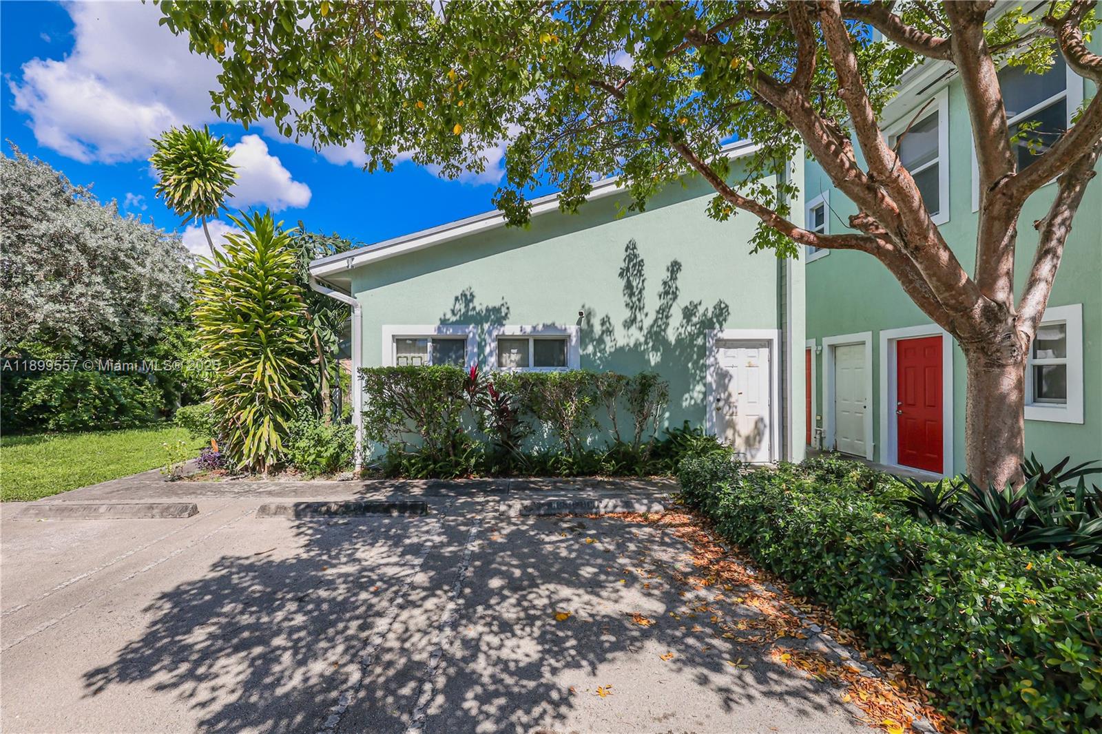 6960 Northwest 4th Avenue, Unit 3 Miami, FL 33150 - Photo 27 of 28 a front view of a house with garden