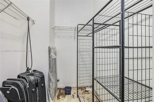 a bathroom with a sink vanity and a toilet