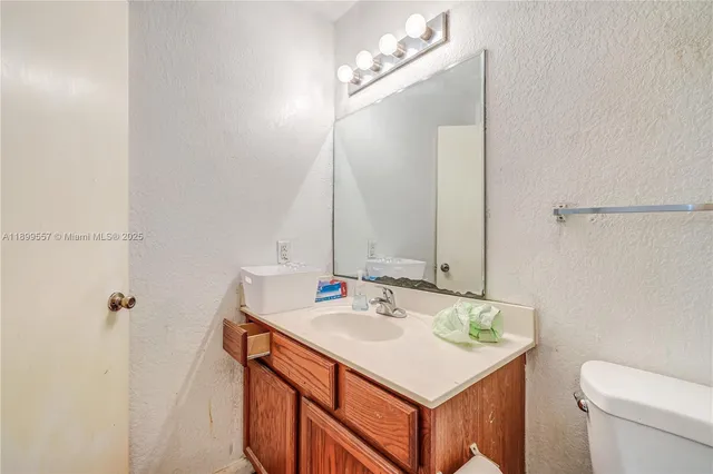 a bathroom with a sink a toilet and a bathtub