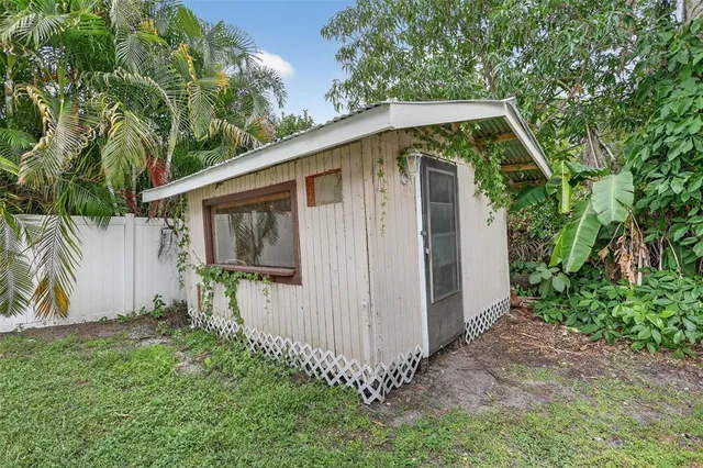 a backyard of a house with lots of green space