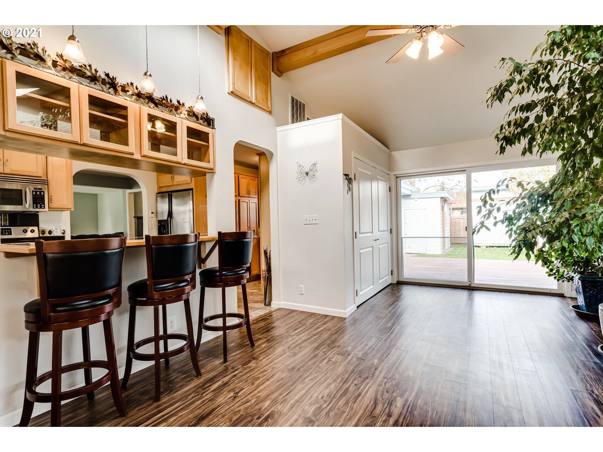 1438 I Street Springfield, OR 97477 - Photo 11 of 32 a view of a dining room with furniture and wooden floor