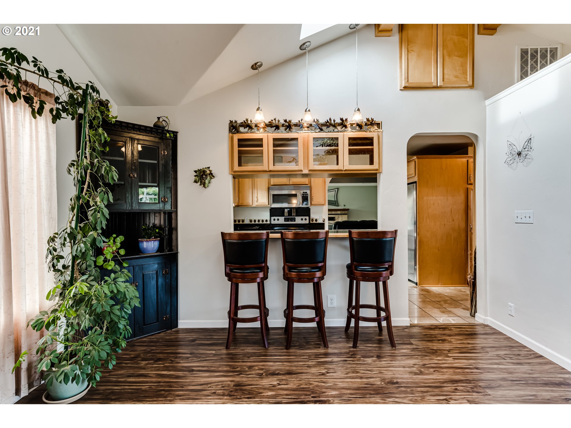 1438 I Street Springfield, OR 97477 - Photo 12 of 32 a dining room with furniture and wooden floor