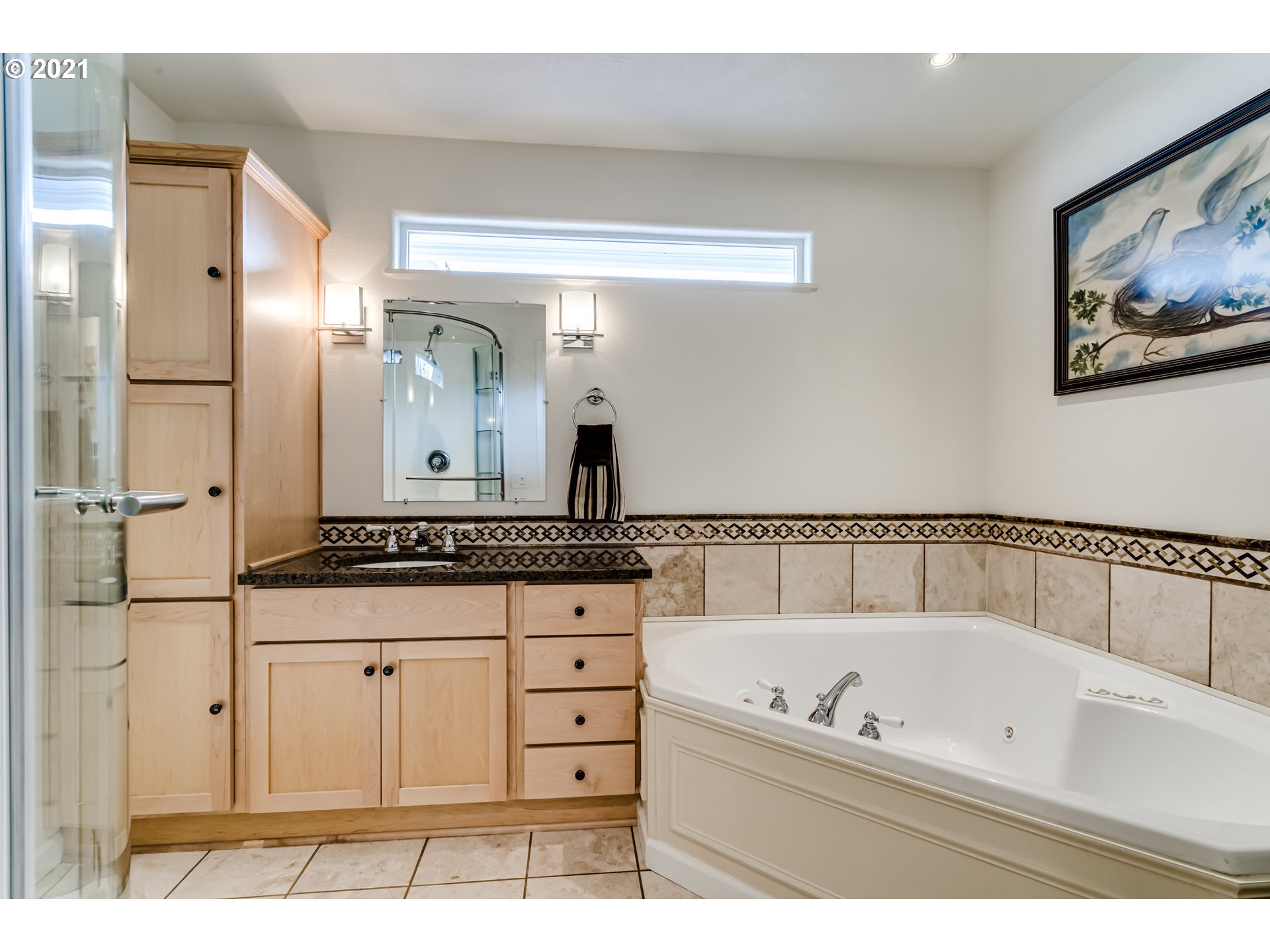 1438 I Street Springfield, OR 97477 - Photo 19 of 32 a bathroom with a bathtub and a shower