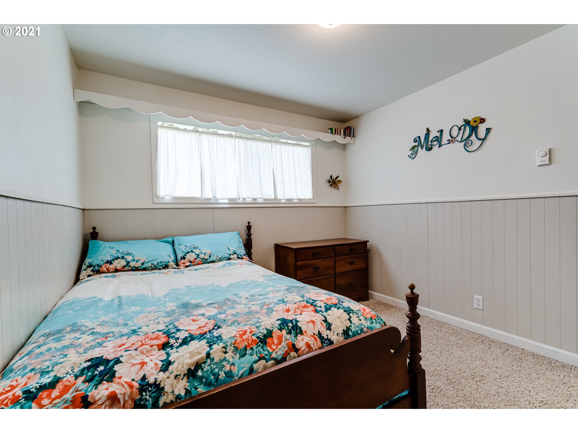 1438 I Street Springfield, OR 97477 - Photo 23 of 32 a bedroom with a bed and a window
