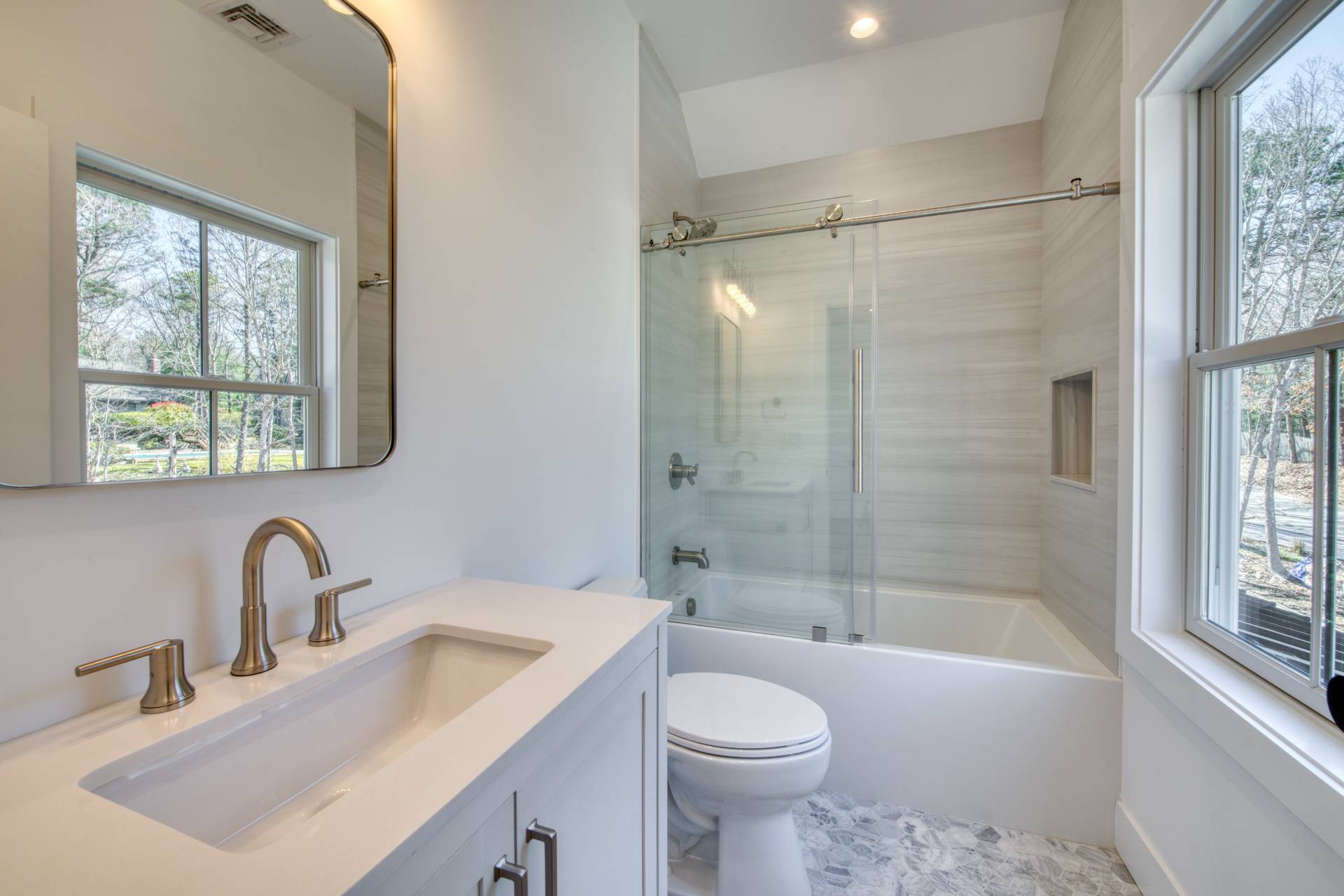 18 Barnes Avenue East Hampton, NY 11937 - Photo 22 of 35 a bathroom with a sink toilet and shower