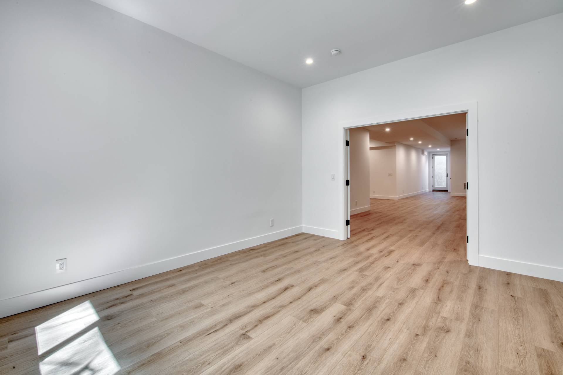 18 Barnes Avenue East Hampton, NY 11937 - Photo 25 of 35 wooden floor in an empty room