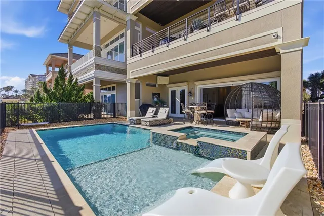 a bedroom with furniture and a large bed