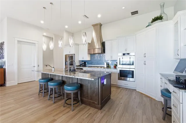 a bedroom with a bed and a table