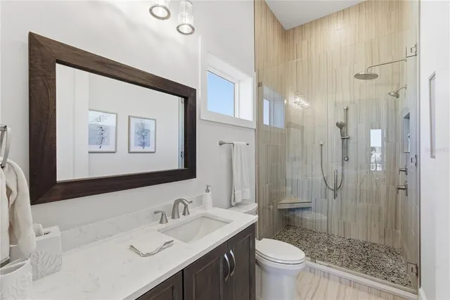 a living room with furniture a rug and a window