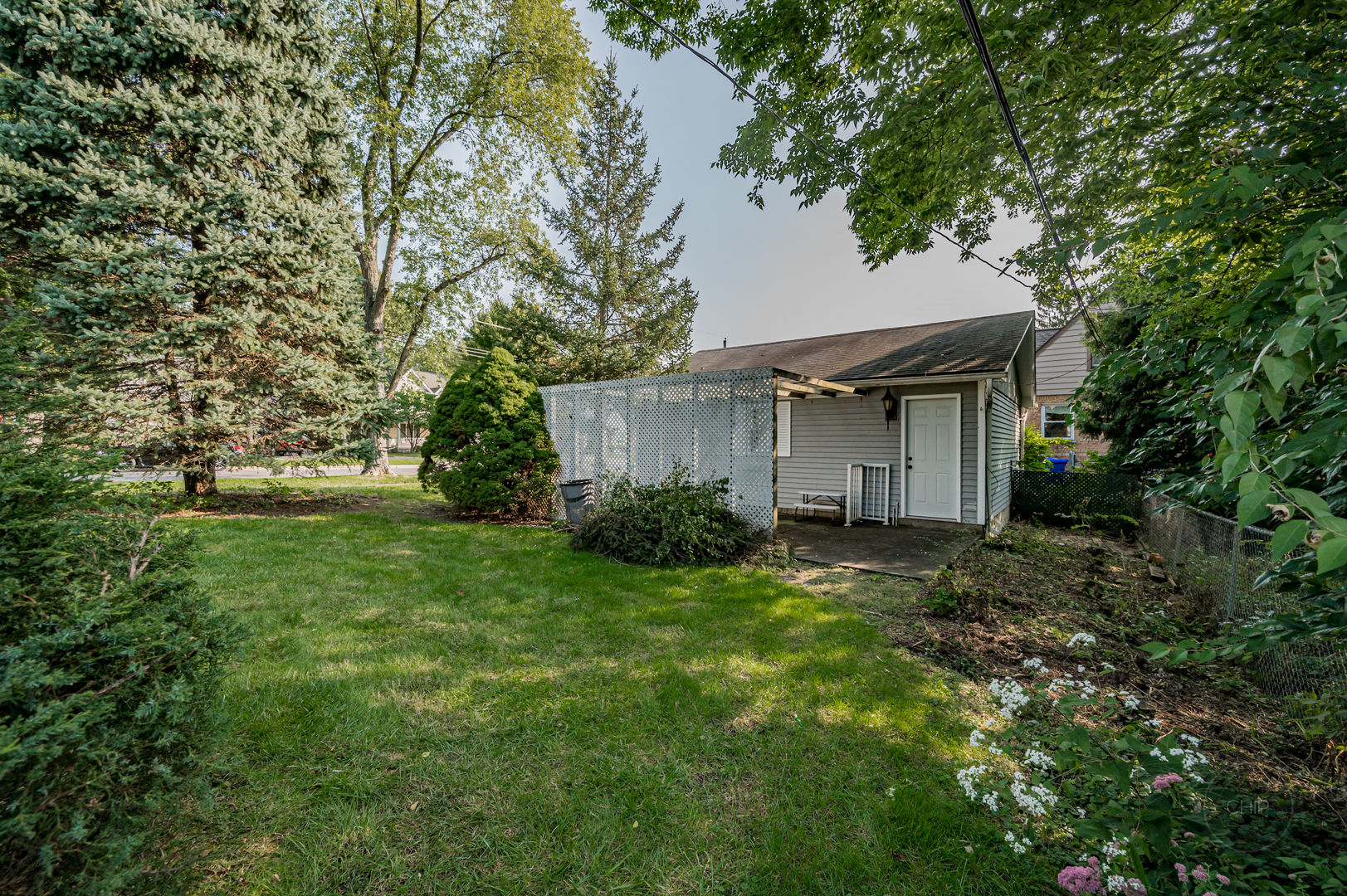 843 Pick Street Wheaton, IL 60187 - Photo 22 of 33 a view of a house with a yard