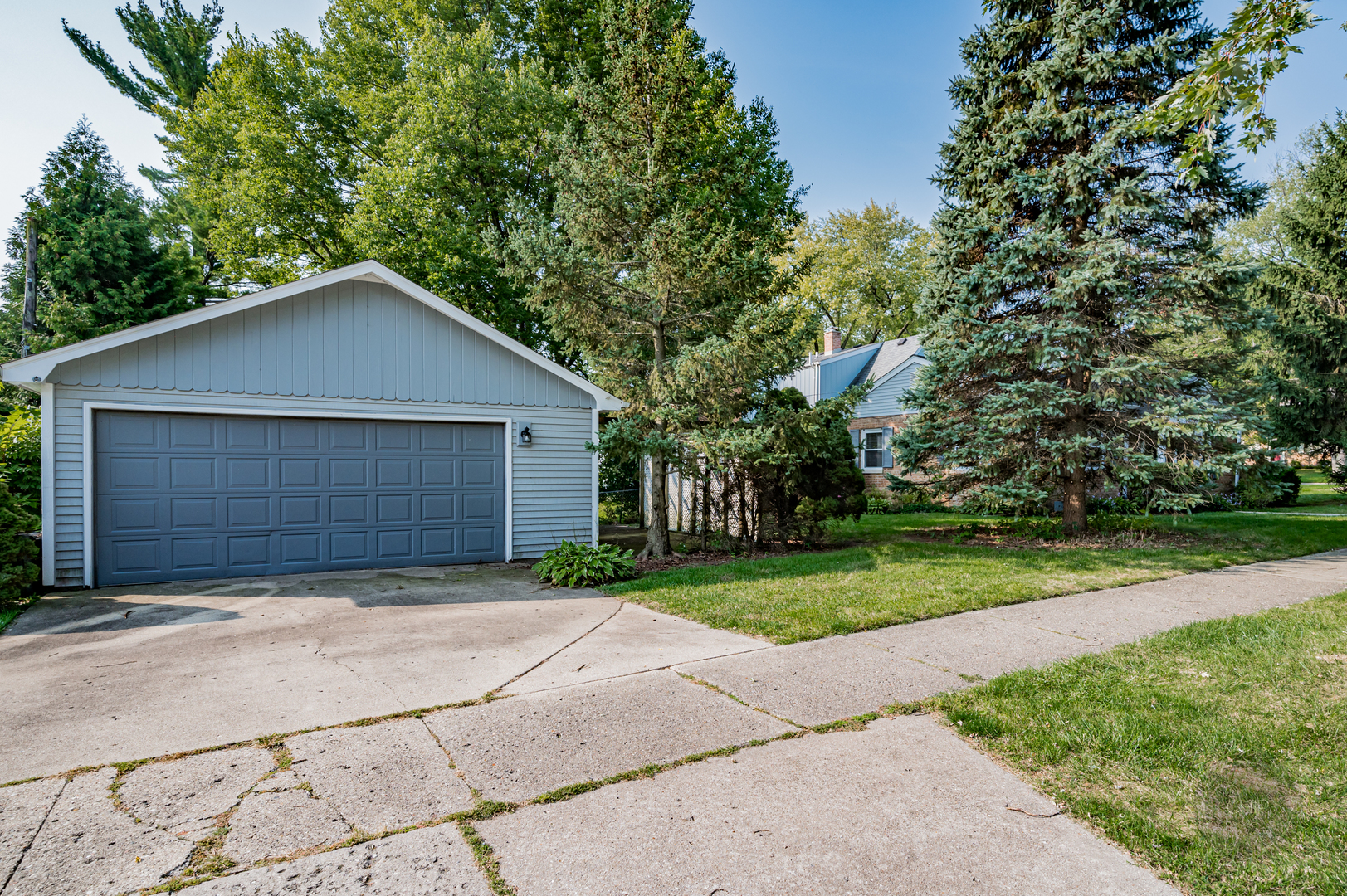 843 Pick Street Wheaton, IL 60187 - Photo 26 of 33 a front view of a house with a yard and garage