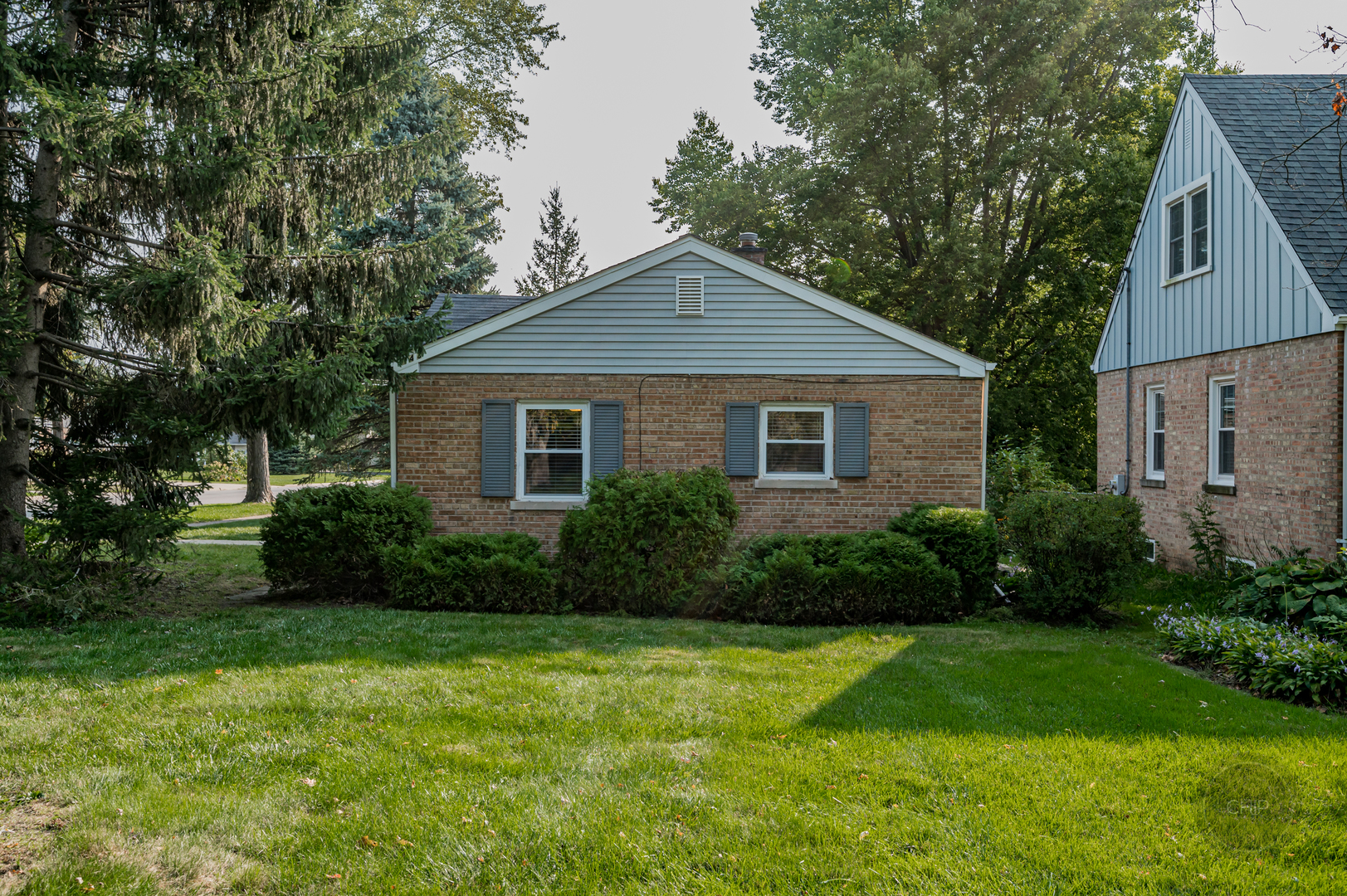 843 Pick Street Wheaton, IL 60187 - Photo 32 of 33 a front view of house with yard and green space
