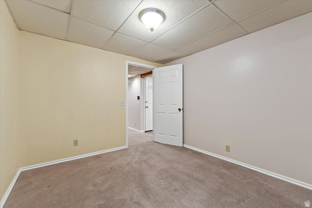 888 East 6895 South Midvale, UT 84047 - Photo 42 of 54 Versatile lower-level room with ample floor space, suitable for a bedroom, office, or hobby area.