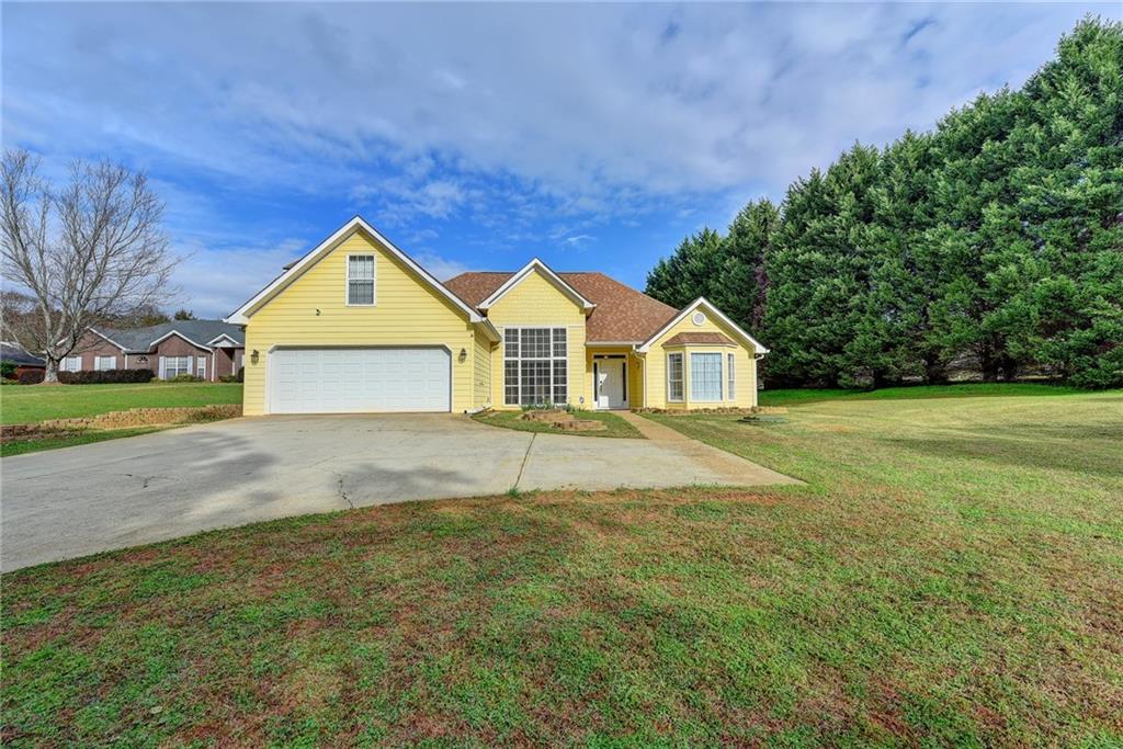 5988 River Road Flowery Branch, GA 30542 - Photo 1 of 1 Front of home with level driveway.
