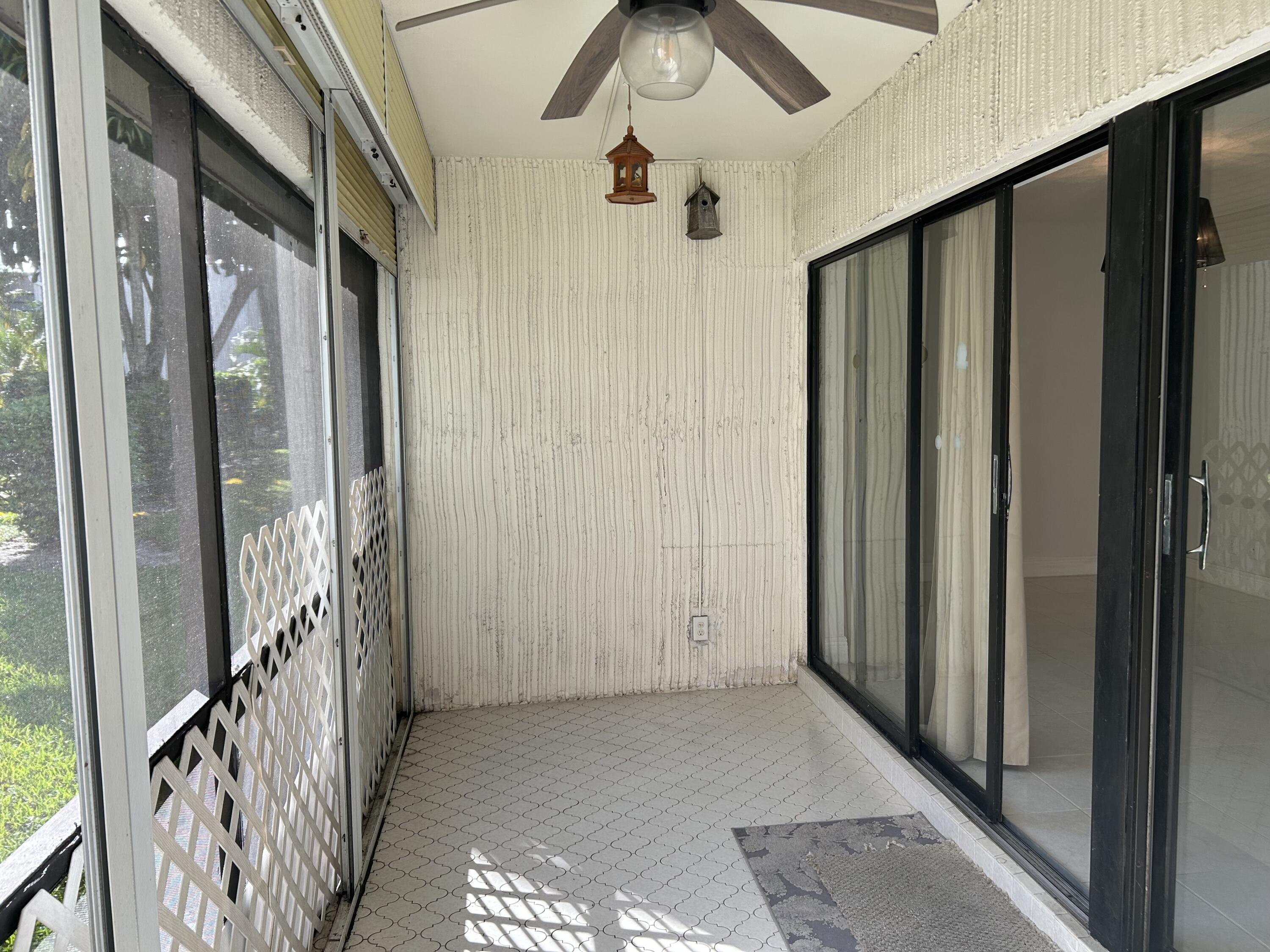 6514 Spring Bottom Way, Unit 125 Boca Raton, FL 33433 - Photo 12 of 27 Screened in Patio with Fan