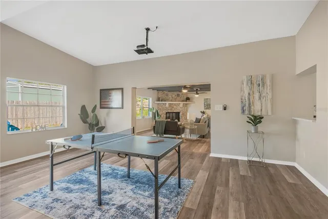 a workspace with furniture and wooden floor