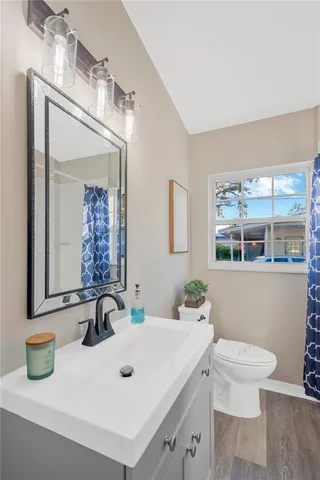 a view of backyard with seating area and green space