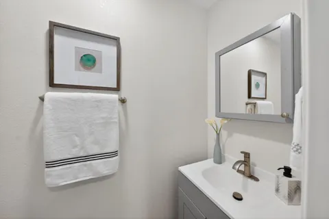 a bed room with a bed and a window