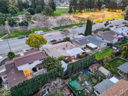 an aerial view of a house with a garden