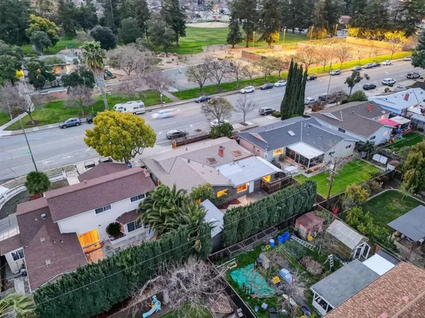 an aerial view of a house with a garden