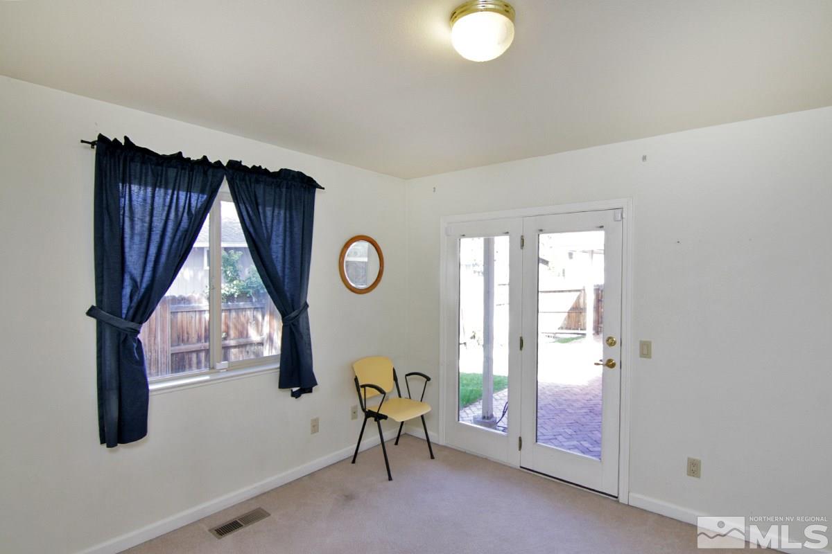 560 Citadel Road Reno, NV 89503 - Photo 23 of 25 a living room with furniture and a window